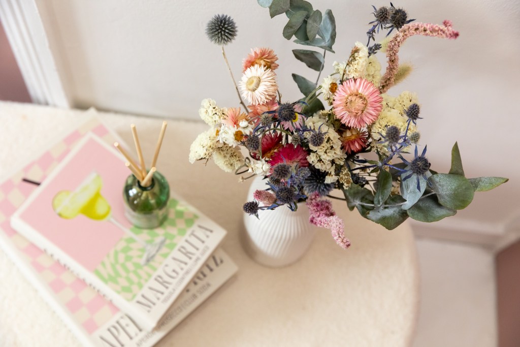 Dried Flower Bouquet. Pastel pinks, blues and turquoises. Lifestyle shot for Flores and Bloom. UK grown dried flowers. Home Decor