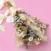 Dried Wedding Bouquet. Bridal bouquet with preserved white and neutral dried flowers and soft light-pink accents, tied with a gorgeous ivory ribbon