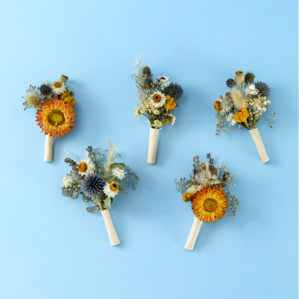 Set of five rustic blue and burnt orange dried flower buttonholes with strawflowers, bunny tails and thistles, handmade boho wedding boutonnieres for groom and groomsmen.