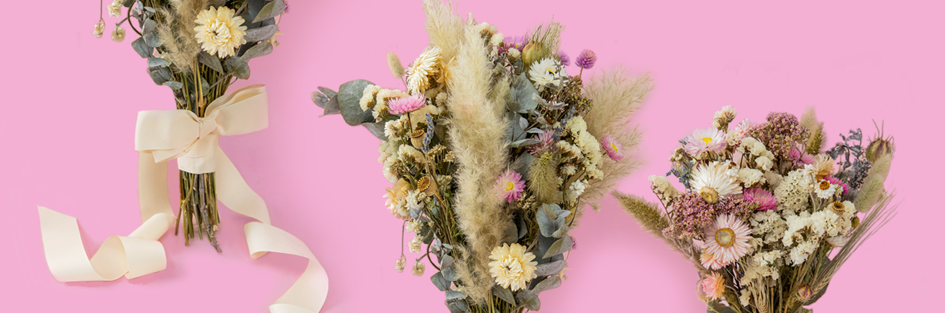 Dried Wedding Bouquet Dried Wedding Bouquets. Bridal and matching bridesmaid bouquets with preserved white, ivory and neutral dried flowers and soft light-pink accents, tied with a gorgeous ivory ribbon