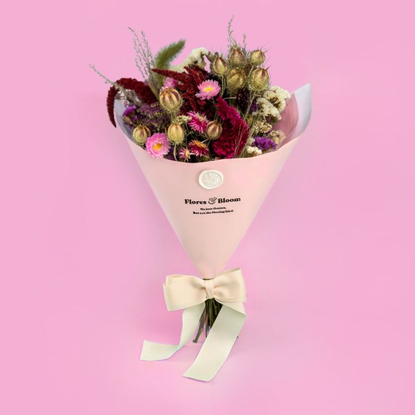 Romantic red and pink dried flower bouquet featuring celosia, amaranthus, strawflower, statice and nigella, handmade in the UK and perfect for gifting