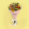 Farmhouse dried flower bouquet featuring colourful blooms in orange, yellow, blue and white tones agains a soft yellow background, ideal for a thinking of you gift